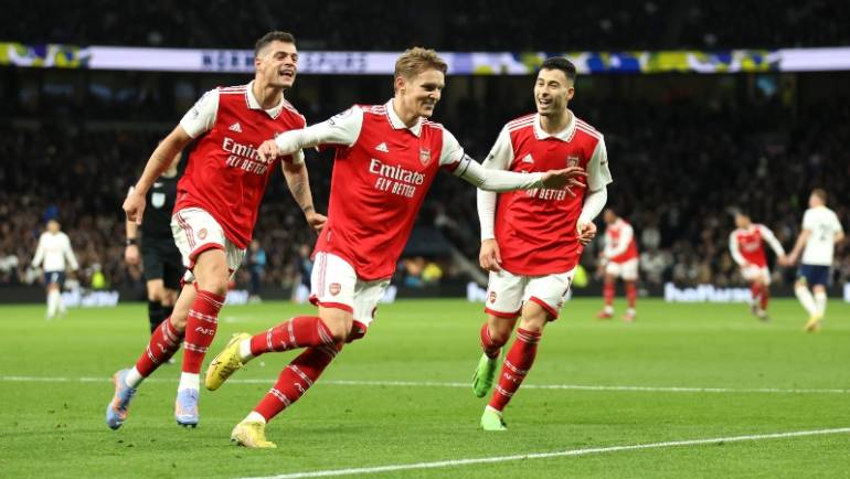 Arsenal eight points clear in Premier League after rampant derby win at Tottenham