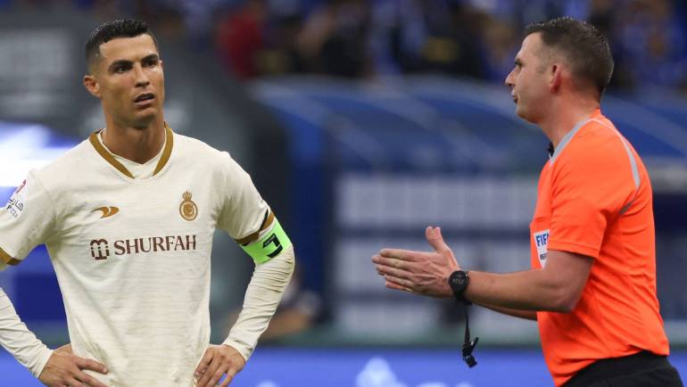 Why was Premier League referee Michael Oliver booking Cristiano Ronaldo in the Saudi Pro League this week?