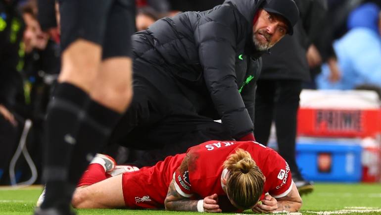 Liverpool’s Kostas Tsimikas taken to hospital after flooring Jurgen Klopp in Arsenal game