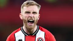 McBurnie’s 103rd-minute penalty helps Blades draw