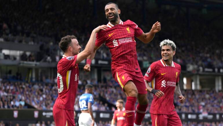 Liverpool’s new era under Slot begins with win at Ipswich and scoring record for Salah